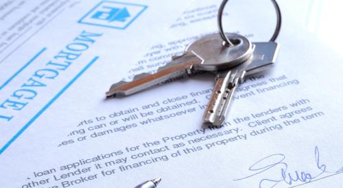 Keys on mortgage paperwork for housing contract