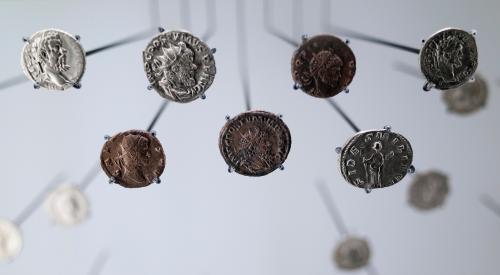 Coins on wire