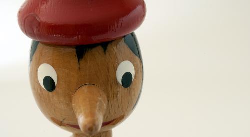 Pinocchio wooden figurine nose grows when he tells a lie 