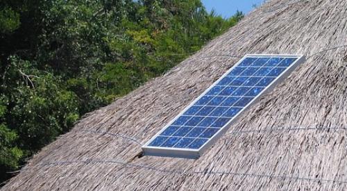 Solar panel on thatch hut roof