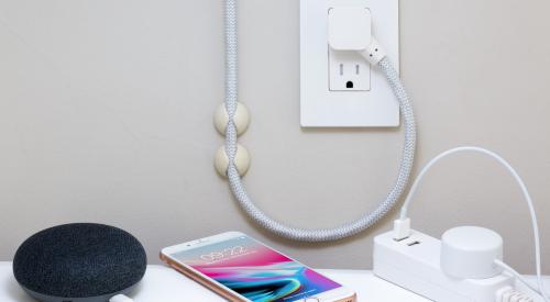 Smart home tech plugged into outlet