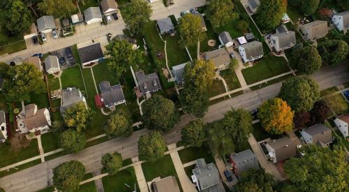 Aerial view of houses and yards in residential neighborhood