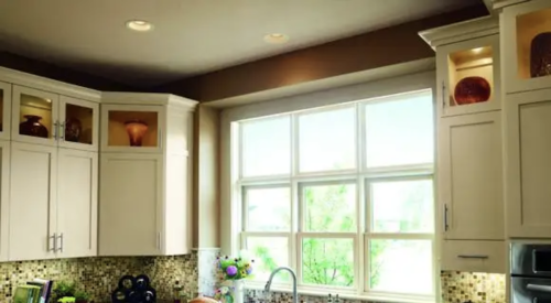 windows over kitchen sink admit plenty of natural light