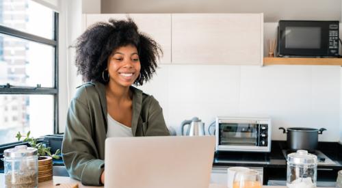 Woman looking at homes online