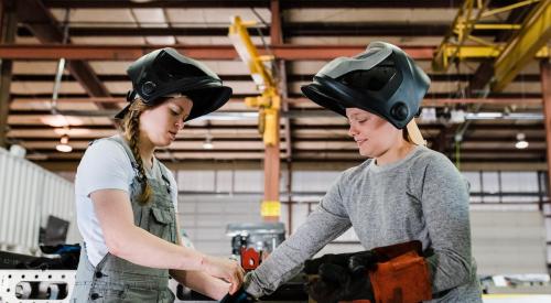 Young women welders at work