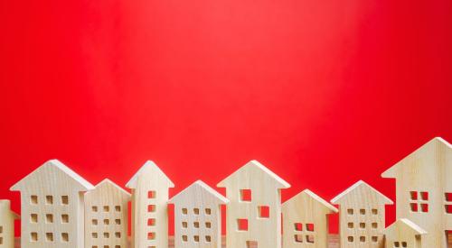 Wood house models with red background
